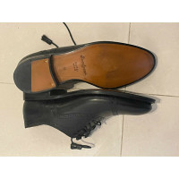 Gucci Chaussures à lacets en Cuir en Noir