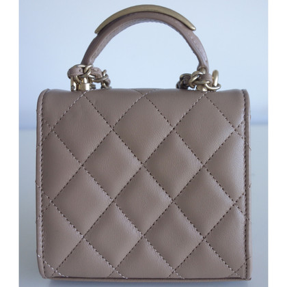 Chanel Classic Flap Bag Extra Mini aus Leder in Beige