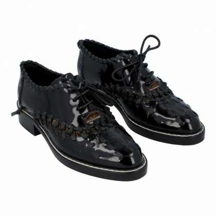 Louis Vuitton Chaussures à lacets en Cuir en Noir