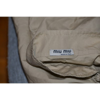 Miu Miu Jacke/Mantel aus Baumwolle in Beige