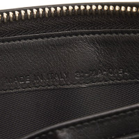 Christian Dior Täschchen/Portemonnaie aus Leder in Schwarz