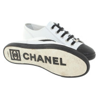 Chanel Chaussures de sport en Noir / Blanc