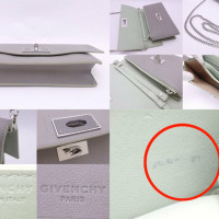 Givenchy Täschchen/Portemonnaie aus Leder in Grau