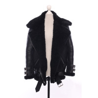 Acne Giacca/Cappotto in Pelliccia in Nero