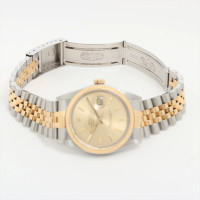Rolex Oyster Perpetual Steel in Gold
