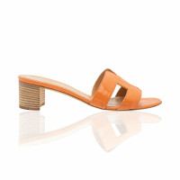Hermès Sandals Leather in Orange