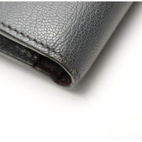 Givenchy Täschchen/Portemonnaie aus Leder in Grau