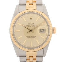 Rolex Oyster Perpetual Steel in Gold
