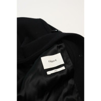Filippa K Jacke/Mantel aus Wolle in Schwarz