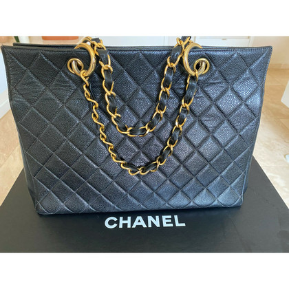 Chanel Grand  Shopping Tote Leer in Goud