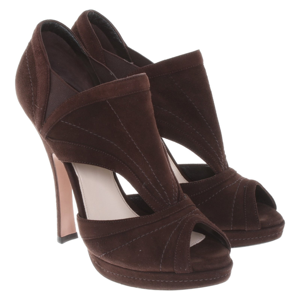 Prada Leather peep toes in dark brown