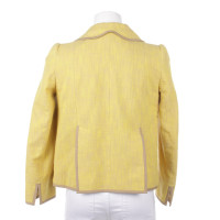 Carven Jacke/Mantel aus Baumwolle in Gelb