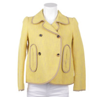 Carven Jacke/Mantel aus Baumwolle in Gelb