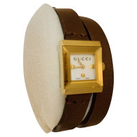 Gucci Armbanduhr aus Leder in Gold