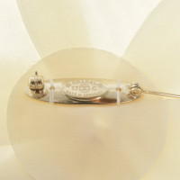 Chanel Cream-colored brooch