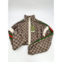 Gucci Jacket/Coat in Brown