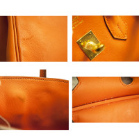 Hermès Birkin Bag 25 aus Leder in Orange