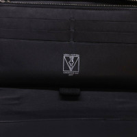 Louis Vuitton Portefeuille Anouchka aus Canvas in Grau