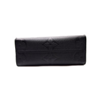 Louis Vuitton Onthego Monogram Empreinte Leather in Black