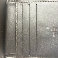Louis Vuitton Utah Leather in Brown