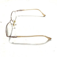 Yves Saint Laurent Glasses in Gold