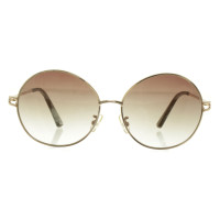 Calvin Klein Sunglasses in ocher / gold