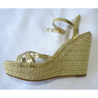 Michael Kors Wedges in Gold