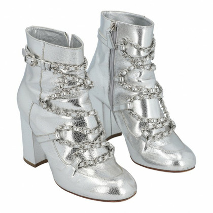 Chanel Ankle boots Leather in Silvery