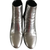 Saint Laurent Ankle boots Leather in Silvery