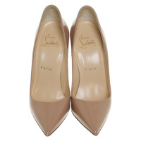 Christian Louboutin So Kate in Pelle verniciata in Color carne