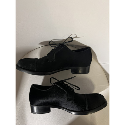 Dolce & Gabbana Schnürschuhe aus Leder in Schwarz