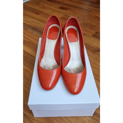 Dior Pumps/Peeptoes Patent leather in Red