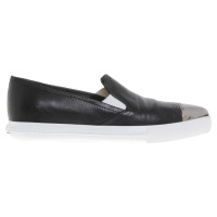 Miu Miu Leder-Slipper in Schwarz