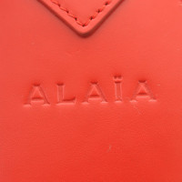 Alaïa Clutch aus Leder in Rot