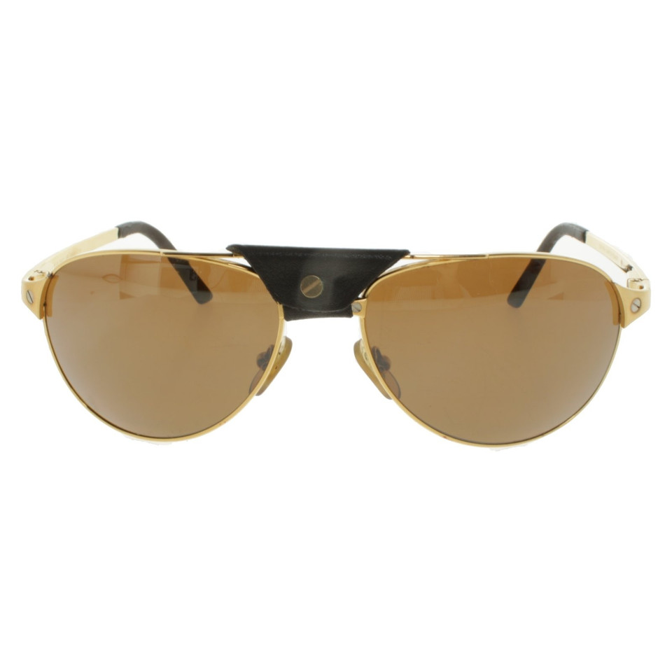 Cartier Sonnenbrille in Goldfarben