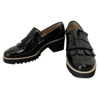 Hogan Slipper/Ballerinas aus Lackleder in Schwarz