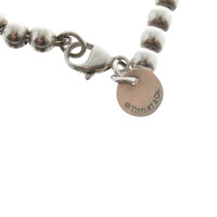 Tiffany & Co. Ball bracelet with heart pendant