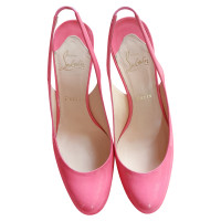 Christian Louboutin Pumps/Peeptoes aus Lackleder in Rosa / Pink