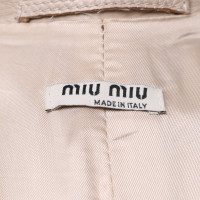 Miu Miu Jacke/Mantel aus Leder in Beige