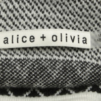 Alice + Olivia Robe avec motif à rayures en noir et blanc