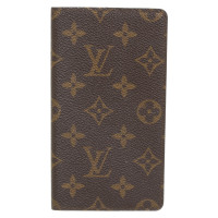 Louis Vuitton Täschchen/Portemonnaie aus Canvas in Braun