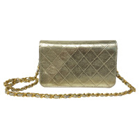 Chanel Gold-colored flap bag