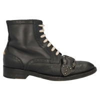 Gucci Stiefeletten aus Leder in Schwarz