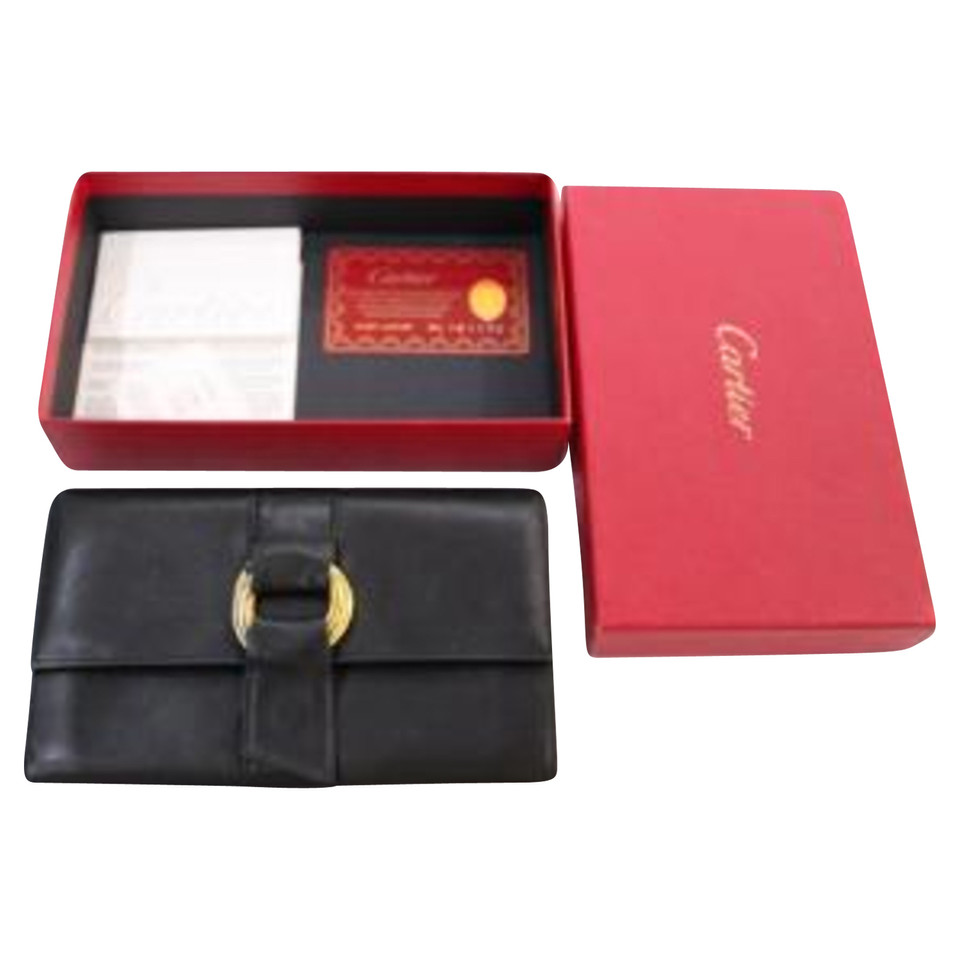 Cartier Täschchen/Portemonnaie aus Leder in Schwarz