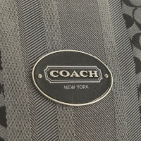 Coach Handbag with logo pattern