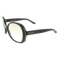 Miu Miu Sunglasses in black