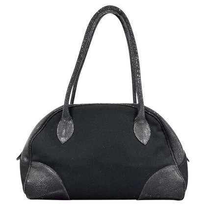 Alaïa Handtasche aus Wolle in Schwarz
