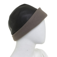 Hermès Leather hat with cashmere lining