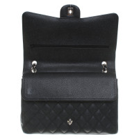 Chanel "Maxi Double Flap Bag" en noir