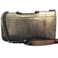 Chanel Classic Flap Bag Medium Leer in Goud